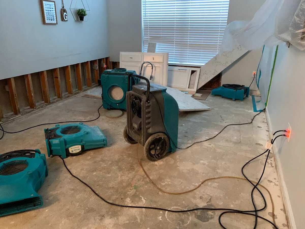 Dehumidifier in flood-cut room for Water Damage Restoration in Albertville